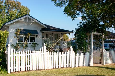 A family home behind a front fence in suburban New South Wales