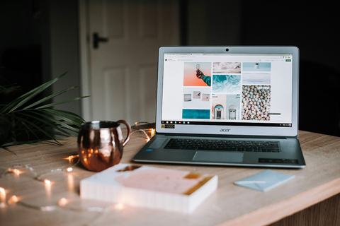 An open laptop on a table at home
