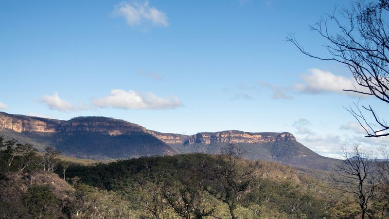 Open farmland in a valley in the Blue Mountains region